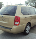 kia sedona 2011 gold van lx gasoline 6 cylinders front wheel drive automatic 32901