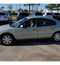 ford taurus 2005 green sedan sel gasoline 6 cylinders front wheel drive 4 speed automatic 77090