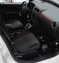 dodge caliber 2010 white hatchback sxt gasoline 4 cylinders front wheel drive automatic 91731