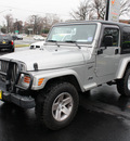 jeep wrangler 2002 silver suv sport gasoline 6 cylinders 4 wheel drive 5 speed manual 07730
