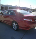 toyota camry 2011 red sedan se v6 gasoline 6 cylinders front wheel drive automatic 75503
