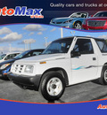 chevrolet tracker 1998 white suv gasoline 4 cylinders rear wheel drive 5 speed manual 34474