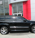 jeep grand cherokee 2008 black suv srt8 gasoline 8 cylinders 4 wheel drive automatic 33884