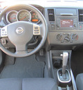 nissan versa 2012 gray hatchback sl gasoline 4 cylinders front wheel drive automatic 33884