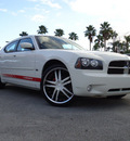 dodge charger 2010 white sedan sxt gasoline 6 cylinders rear wheel drive automatic 33157