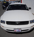 ford mustang 2009 white coupe gasoline 6 cylinders rear wheel drive standard 79925