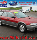 subaru legacy 1997 red wagon outback gasoline 4 cylinders all whee drive 5 speed manual 55811