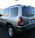 mazda tribute 2001 tan suv lx gasoline 6 cylinders 4 wheel drive automatic with overdrive 07702