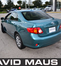 toyota corolla 2009 green sedan le gasoline 4 cylinders front wheel drive automatic 32771