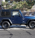 jeep wrangler 2000 black suv sport gasoline 6 cylinders 4 wheel drive 5 speed manual 80012