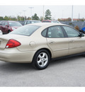 ford taurus 2002 beige sedan ses gasoline 6 cylinders front wheel drive automatic 77388