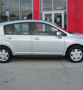 nissan versa 2009 silver hatchback gasoline 4 cylinders front wheel drive automatic 33884