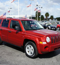 jeep patriot 2009 red suv sport gasoline 4 cylinders 2 wheel drive automatic 33021