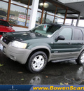 ford escape 2001 green suv xlt gasoline 6 cylinders 4 wheel drive automatic 98032