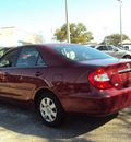 toyota camry 2004 red sedan le gasoline 4 cylinders front wheel drive automatic 32901