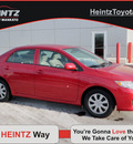 toyota corolla 2009 red sedan le gasoline 4 cylinders front wheel drive automatic 56001