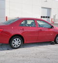 toyota corolla 2009 red sedan le gasoline 4 cylinders front wheel drive automatic 56001