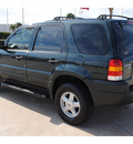 ford escape 2003 green suv xls value gasoline 6 cylinders dohc front wheel drive automatic 77065