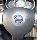 nissan versa 2011 black hatchback 1 8 s gasoline 4 cylinders front wheel drive automatic 76018
