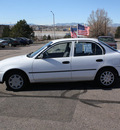 toyota corolla 1995 white sedan gasoline 4 cylinders front wheel drive 5 speed manual 80229