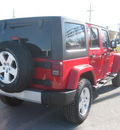 jeep wrangler unlimited 2012 red suv sahara gasoline 6 cylinders 4 wheel drive 5 speed automatic 62863