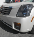 cadillac cts 2004 white sedan tan gasoline 6 cylinders rear wheel drive automatic 34731