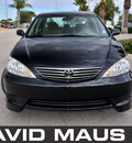 toyota camry 2006 black sedan le gasoline 4 cylinders front wheel drive automatic 32771