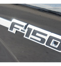 ford f 150 2009 black xlt gasoline 8 cylinders 2 wheel drive automatic 77388