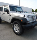 jeep wrangler unlimited 2012 silver suv sport gasoline 6 cylinders 4 wheel drive automatic 33157