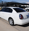 nissan altima 2006 white sedan 3 5 sl gasoline 6 cylinders front wheel drive automatic 76087