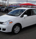 nissan versa 2010 white hatchback gasoline 4 cylinders front wheel drive automatic 79925
