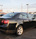 volkswagen jetta 2009 black sedan se gasoline 5 cylinders front wheel drive 6 speed automatic 46410