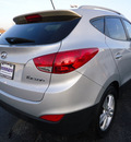 hyundai tucson 2011 silver gasoline 4 cylinders front wheel drive automatic 60007