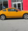 ford mustang 2007 orange coupe gasoline 6 cylinders rear wheel drive automatic 33884