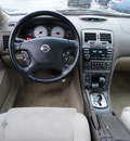 nissan maxima 2002 tan sedan se gasoline 6 cylinders front wheel drive automatic with overdrive 60546