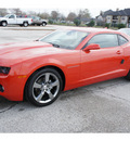 chevrolet camaro 2012 orange coupe gasoline 6 cylinders rear wheel drive 6 spd auto onstar,1 yr safe and snd 77090