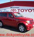 dodge nitro 2011 red suv sxt gasoline 6 cylinders 2 wheel drive automatic 79925