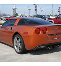 chevrolet corvette 2007 orange coupe gasoline 8 cylinders rear wheel drive automatic 77090