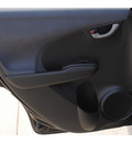 honda fit 2009 black hatchback gasoline 4 cylinders front wheel drive automatic 77065