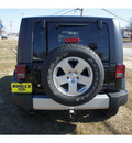 jeep wrangler 2010 black suv sahara gasoline 6 cylinders 4 wheel drive automatic with overdrive 07724