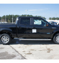 ford f 150 2012 black lariat gasoline 6 cylinders 4 wheel drive automatic 77388