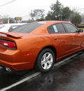 dodge charger 2011 orange sedan gasoline 6 cylinders rear wheel drive automatic 32447