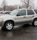 ford escape 2001 beige suv xlt gasoline 6 cylinders 4 wheel drive automatic with overdrive 55124