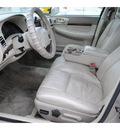 chevrolet impala 2001 tan sedan gasoline 6 cylinders front wheel drive automatic 77037