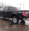 ford f 150 2009 black xlt gasoline 8 cylinders 4 wheel drive automatic with overdrive 46168