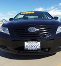 toyota camry 2009 black sedan le gasoline 4 cylinders front wheel drive automatic 90241