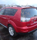 mitsubishi outlander 2010 dk  red suv se gasoline 4 cylinders all whee drive automatic 60443