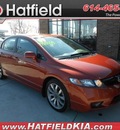 honda civic 2009 orange sedan gasoline 4 cylinders front wheel drive 6 speed manual 43228