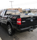 ford f 150 2005 black gasoline 8 cylinders 4 wheel drive automatic with overdrive 13502