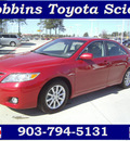 toyota camry 2011 red sedan xle gasoline 4 cylinders front wheel drive automatic 75503